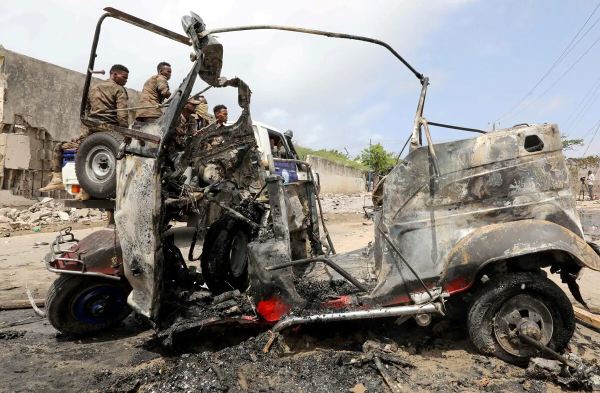 A wreckage of a rickshaw is seen at the scene of a car explosion near Banadir hospital in Mogadishu, Somalia on July 10, 2021. (Feisal Omar/Reuters)