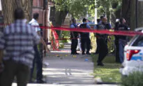 Chicago Police Shoot Suspect After Pointing Gun During Arrest Warrant