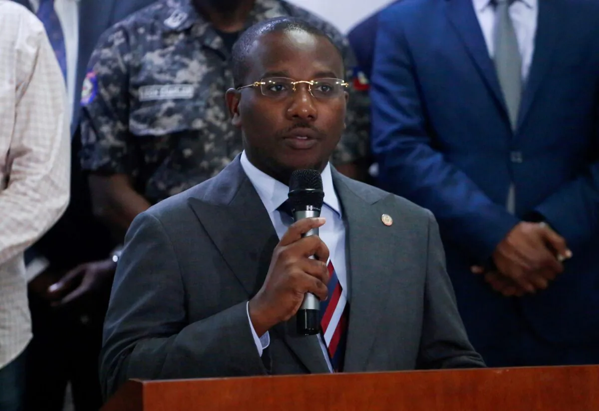 Haiti's interim Prime Minister Claude Joseph addresses the audience after suspects in the assassination of President Jovenel Moise, who was shot dead early Wednesday at his home, were shown to the media, in Port-au-Prince, Haiti, on July 8, 2021. (Estailove St-Val/File Photo/Reuters)