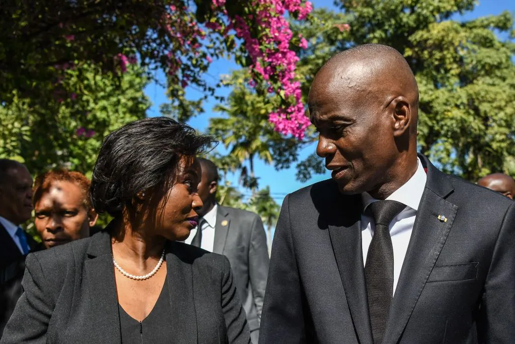 The late president of Haiti Jovenel Moise (R) arrives with the first lady Martine Moise (L) for the official ceremony of Haiti's 10th earthquake anniversary in Port-au-Prince, on Jan. 12, 2020. (Photo by Chandan Khann/AFP)