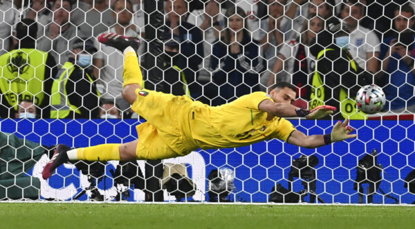 Italy's goalkeeper Gianluigi Donnarumma makes a save