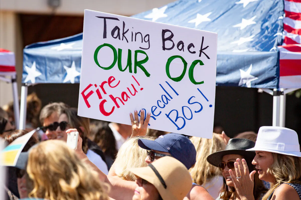 People gather in protest in front of the Orange County Hall of Administration in Santa Ana, Calif., on May 25, 2021. (John Fredricks/The Epoch Times)