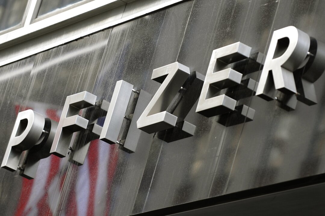 A sign for Pfizer is displayed in New York in a file photo. (Timothy A. Clary/AFP via Getty Images)