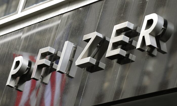 A sign for Pfizer is displayed in New York in a file photo. (Timothy A. Clary/AFP via Getty Images)