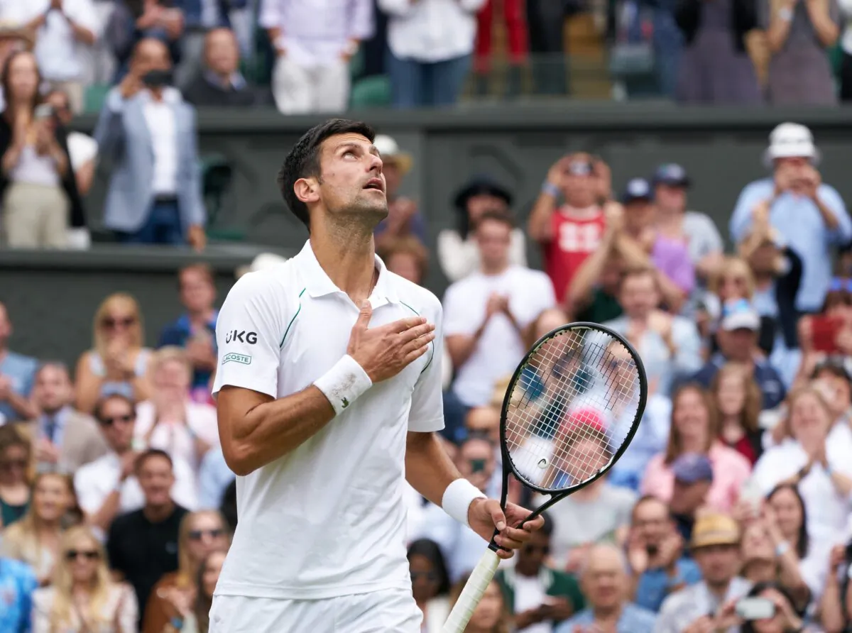 Novak Djokovic of Serbia celebrates winning the mens final against Matteo Berrettini of Italy at The Wimbledon Tennis Championships in London, UK, on July 11, 2021. (Peter van den Berg/USA Today Sports via Reuters)