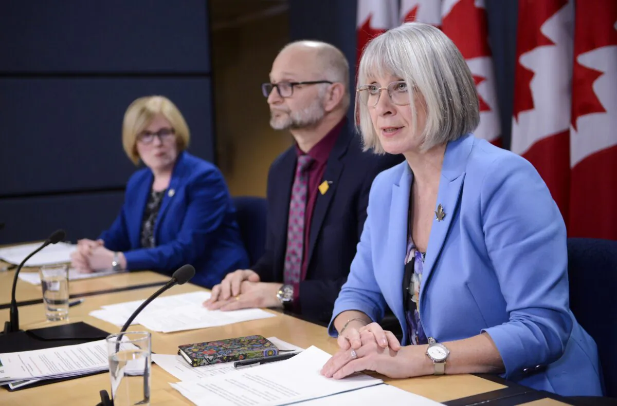 (L–R) Disability Inclusion Minister Carla Qualtrough, Justice Minister David Lametti, and Health Minister Patty Hajdu make an announcement regarding medical assistance in dying legislation at a press conference in Ottawa on Feb. 24, 2020. (The Canadian Press/Sean Kilpatrick)