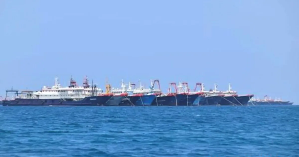 Some of the 220 Chinese vessels are seen moored at Whitsun Reef, South China Sea on March 7, 2021. (Philippine Coast Guard/National Task Force-West Philippine Sea via AP)