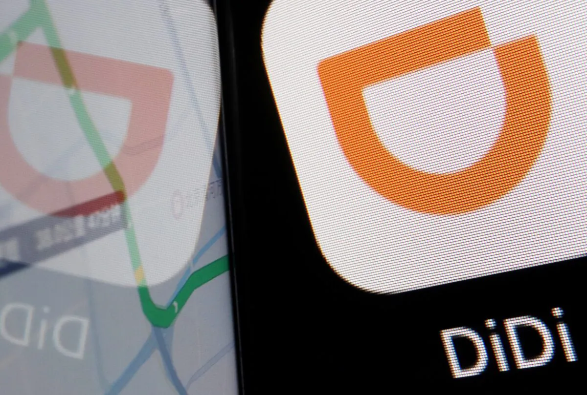 The app logo of Chinese ride-hailing giant DiDi is seen reflected on its navigation map displayed on a mobile phone in this illustration picture taken July 1, 2021. (Florence Lo/Reuters)
