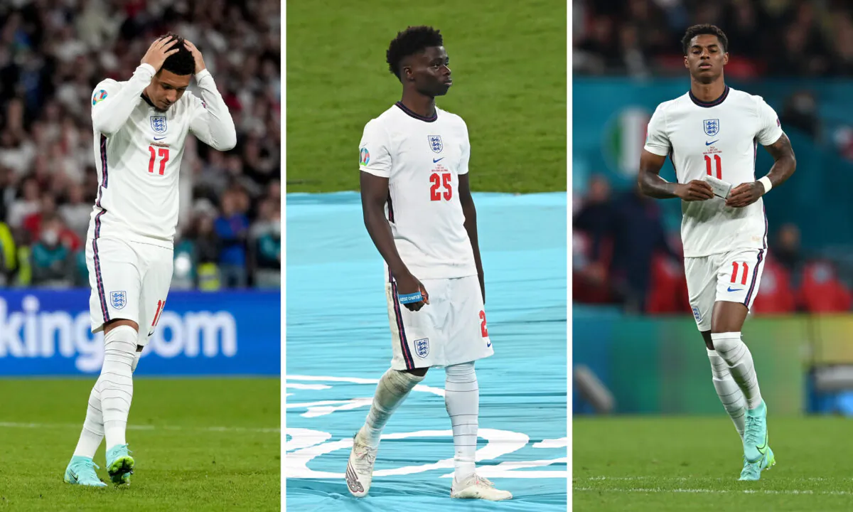 (L-R) England football players Jadon Sancho, Bukayo Saka, and Marcus Rashford during the Euro 2020 final at Wembley Stadium in London on July 11, 2021. (Frank Augstein/Facundo Arrizabalaga/Paul Ellis/Pool/AFP/Getty Images)
