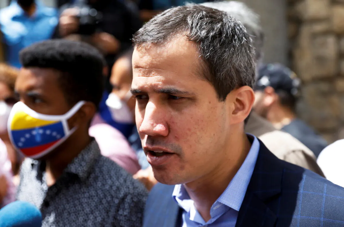 Venezuela's opposition leader Juan Guaido speaks to the media, in Caracas, Venezuela, on July 12, 2021. (Leonardo Fernandez Viloria/Reuters)
