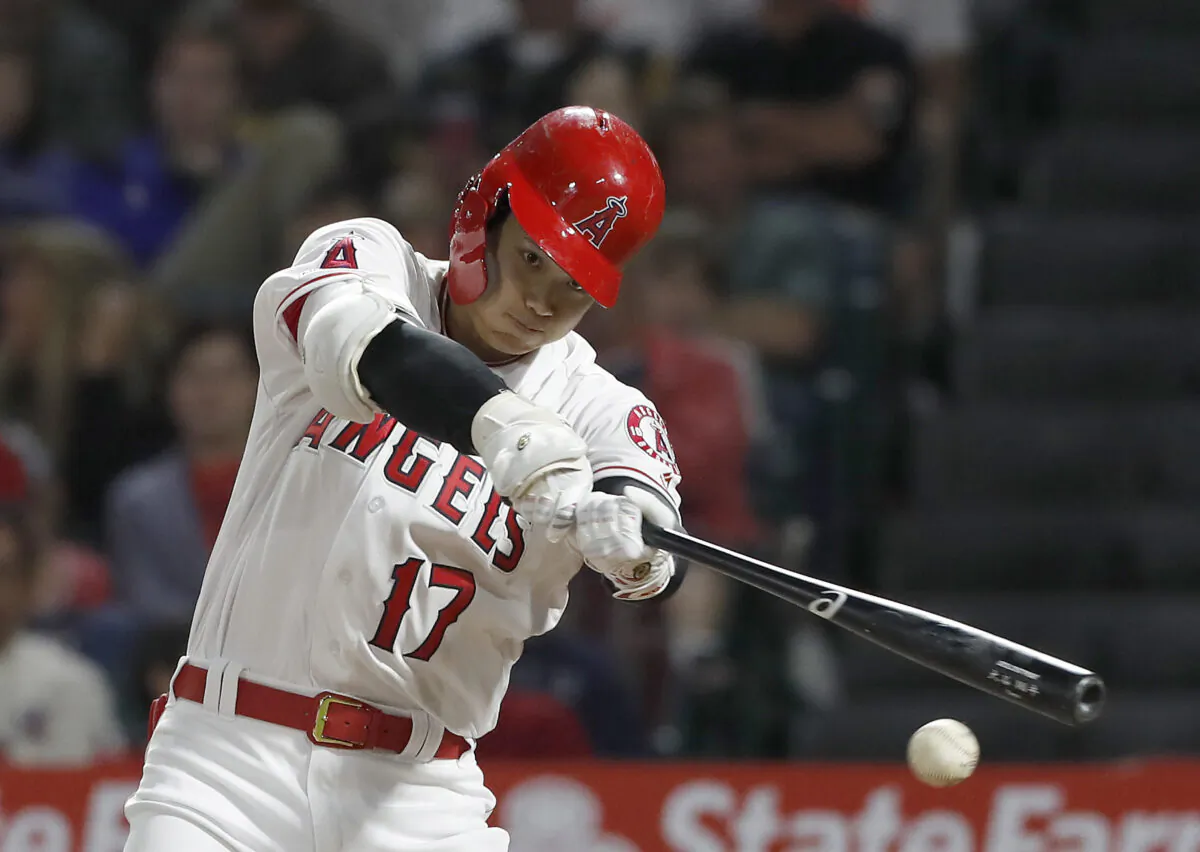 The Los Angeles Angels' Shohei Ohtani connects on a single against the Oakland Athletics at Angel Stadium in Anaheim, Calif., on June 28, 2019. (Luis Sinco/Los Angeles Times/TNS)