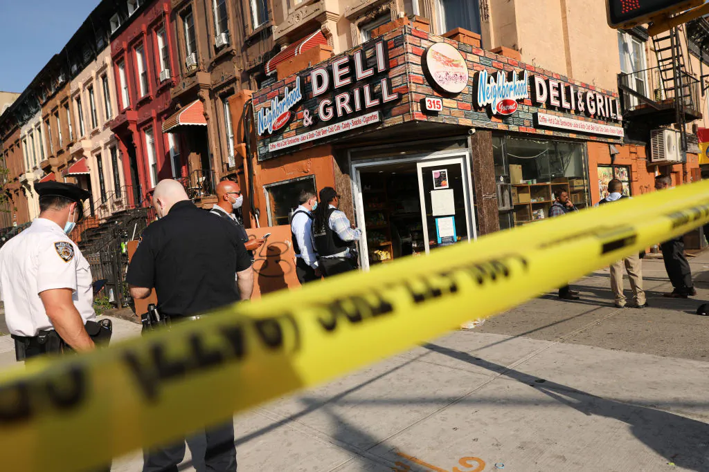 Police stand at the scene of a shooting that happened in the Bedford Stuyvesant neighborhood in Brooklyn on July 16, 2020 in New York City. (Spencer Platt/Getty Images)