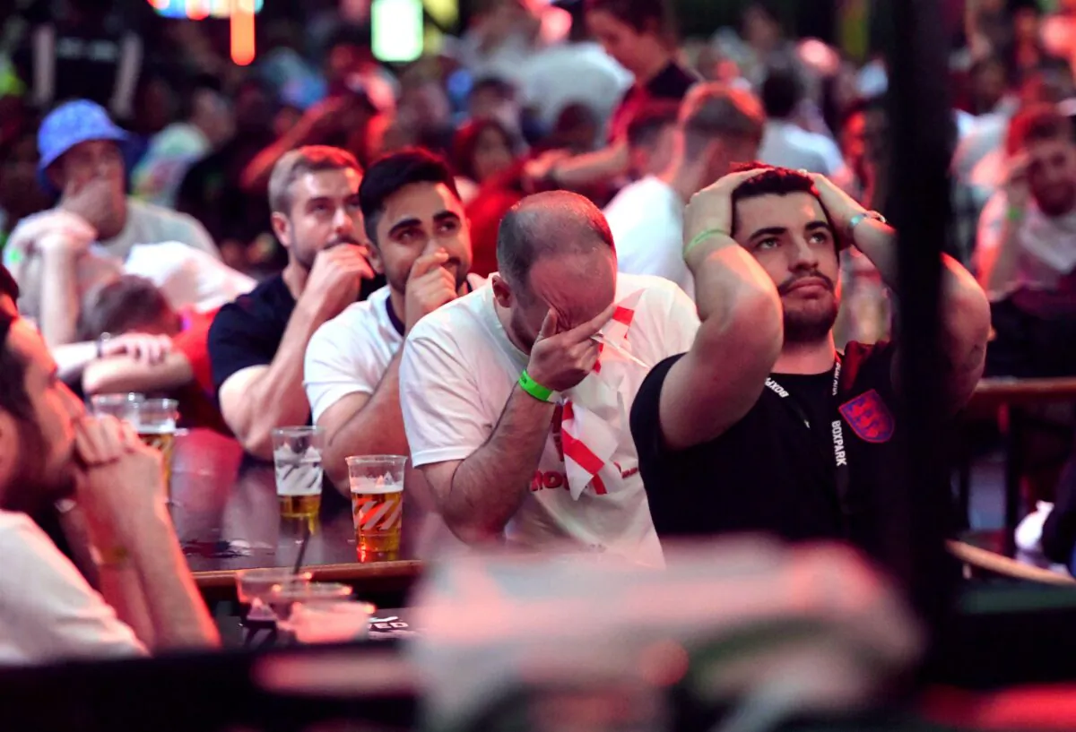 England fans at Boxpark Croydon as Italy’s Leonardo Bonucci scores their side’s first goal, in London on July 11, 2021. (Ashley Western/PA)