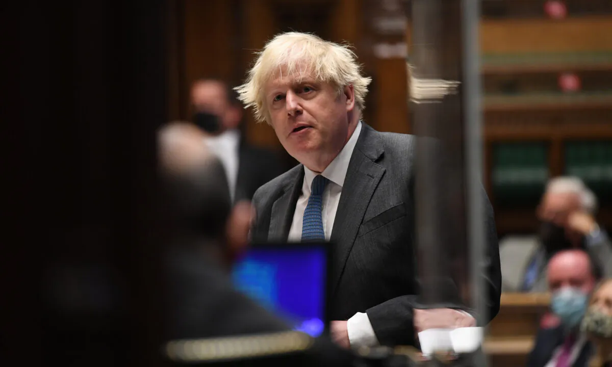 British Prime Minister Boris Johnson takes questions in Parliament in London on June 23, 2021. (Jessica Taylor/UK Parliament/Handout via Reuters)