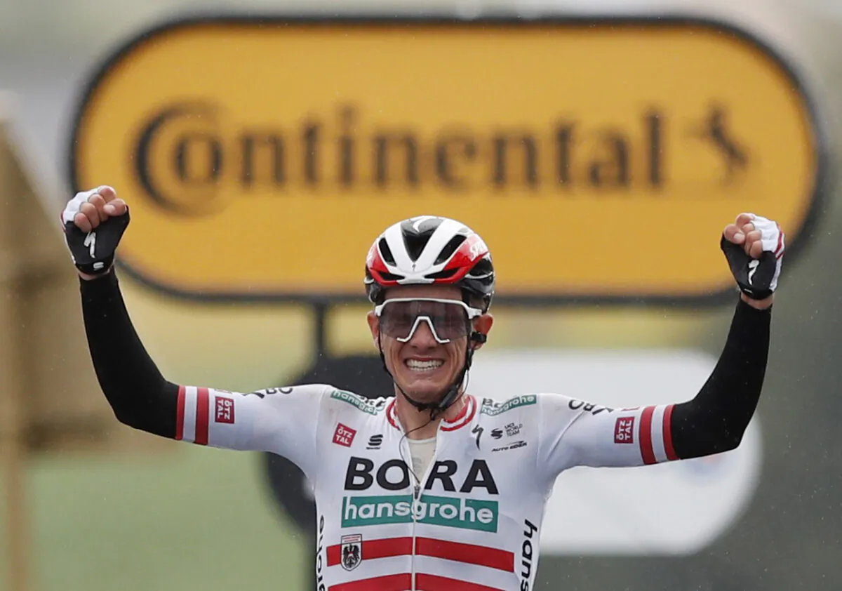 Bora–Hansgrohe rider Patrick Konrad of Austria celebrates as he crosses the finish line to win stage 16 of Tour de France, from Pas de la Case to Saint-Gaudens, in France, on July 13, 2021. (Stephane Mahe/Reuters)