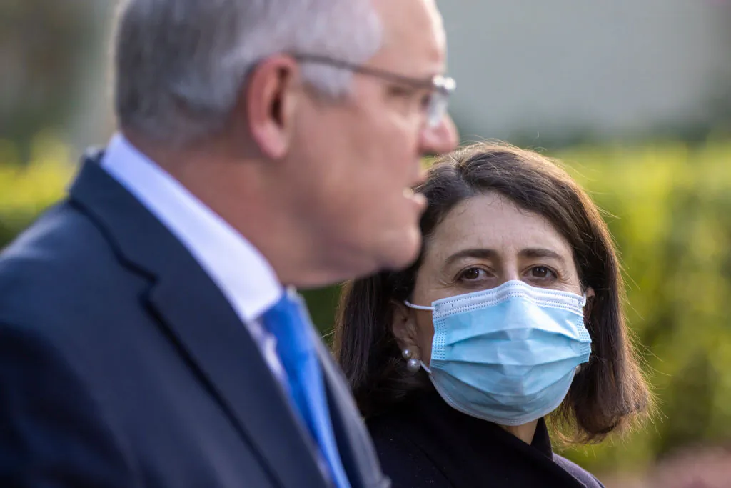 NSW Premier Gladys Berejiklian looks on as Australian Prime Minister Scott Morrison speaks during a press conference at Kirribilli House in Sydney, Australia, on July 13, 2021. (Jenny Evans/Getty Images)