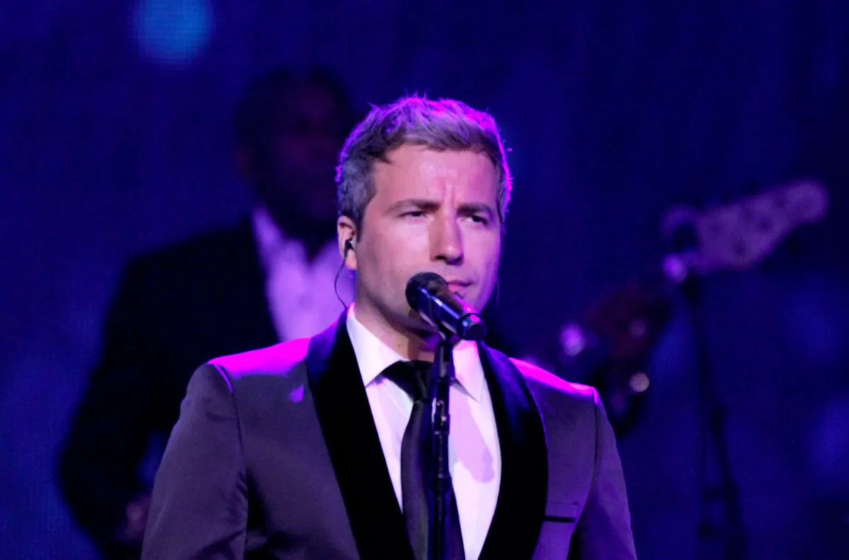 Remigio Pereira of The Canadian Tenors performs onstage at the JW Marriott Phoenix Desert Ridge Resort & Spa in Phoenix, Arizona, on April 8, 2016. (Mike Moore/Getty Images for Celebrity Fight Night)
