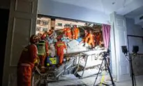 China Hotel Collapse Kills Eight; Rescuers Search for Nine Missing