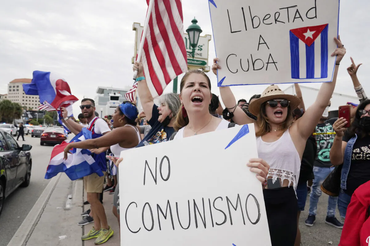 Cuban exiles rally at Versailles Restaurant in Miami's Little Havana neighborhood in support of protesters in Cuba, in Miami, Fla., on July 12, 2021. (Marta Lavandier/AP Photo)