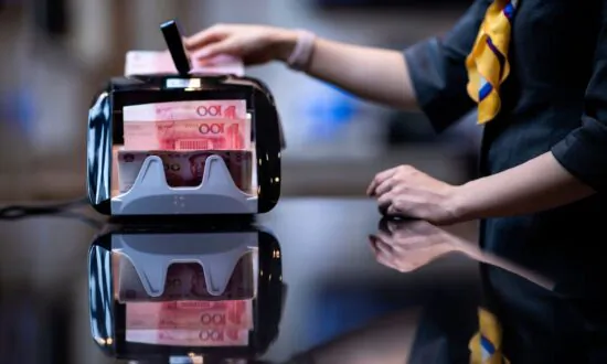 China’s Bank Regulator Warns of Rising Bad Loans Due to Uneven Recovery