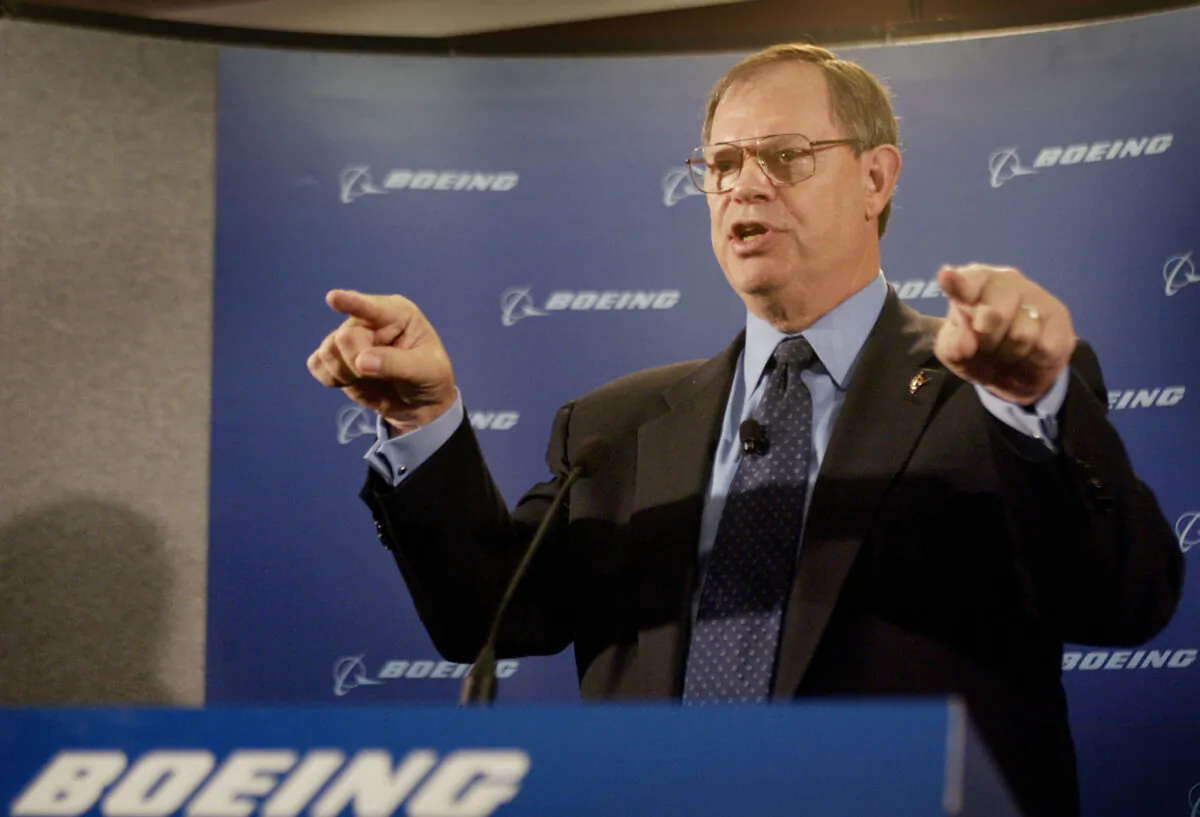 Boeing Chairman and CEO Phil Condit addresses the media following the company's annual shareholders meeting in Chicago on April 28, 2003. (Scott Olson/Getty Images)