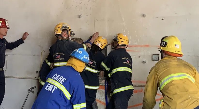 Firefighters rescued a woman trapped between two concrete walls in Santa Ana, Calif., July 13, 2021. (Courtesy of the Orange County Fire Authority)
