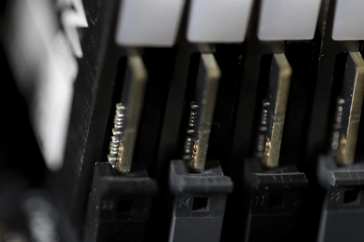 This photo shows the inside of a computer in Jersey City, N.J., on Feb. 23, 2019. (Jenny Kane/AP Photo)