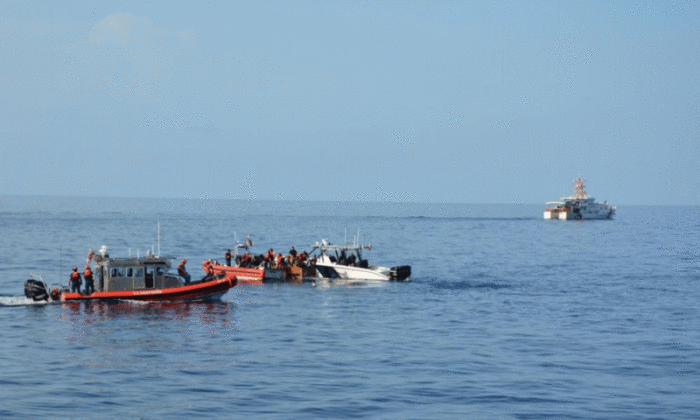U.S. Coast Guard personnel interdict Cubans in a 2018 file photograph. (U.S. Coast Guard)