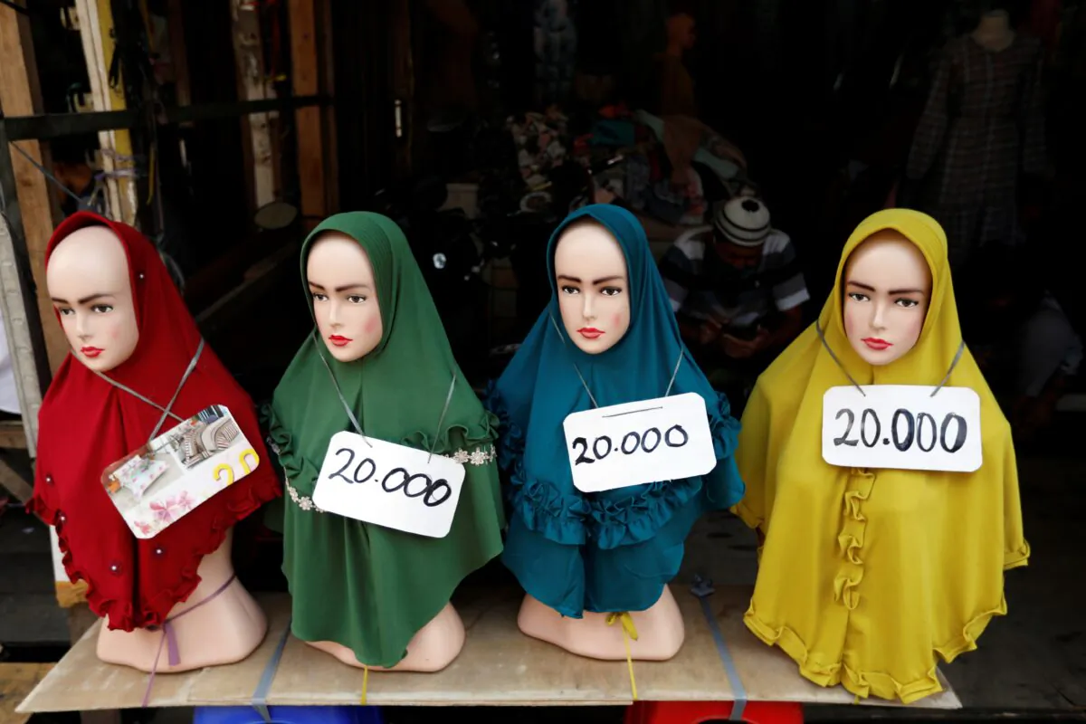 Hijabs for sale at Tanah Abang wholesale market for textile in Jakarta, Indonesia, on May 20, 2020. (Willy Kurniawan/Reuters)