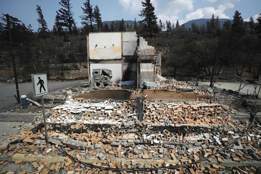 Damaged structures are seen in Lytton, B.C., on July 9, 2021, after a wildfire destroyed most of the village on June 30. (The Canadian Press/Darryl Dyck)