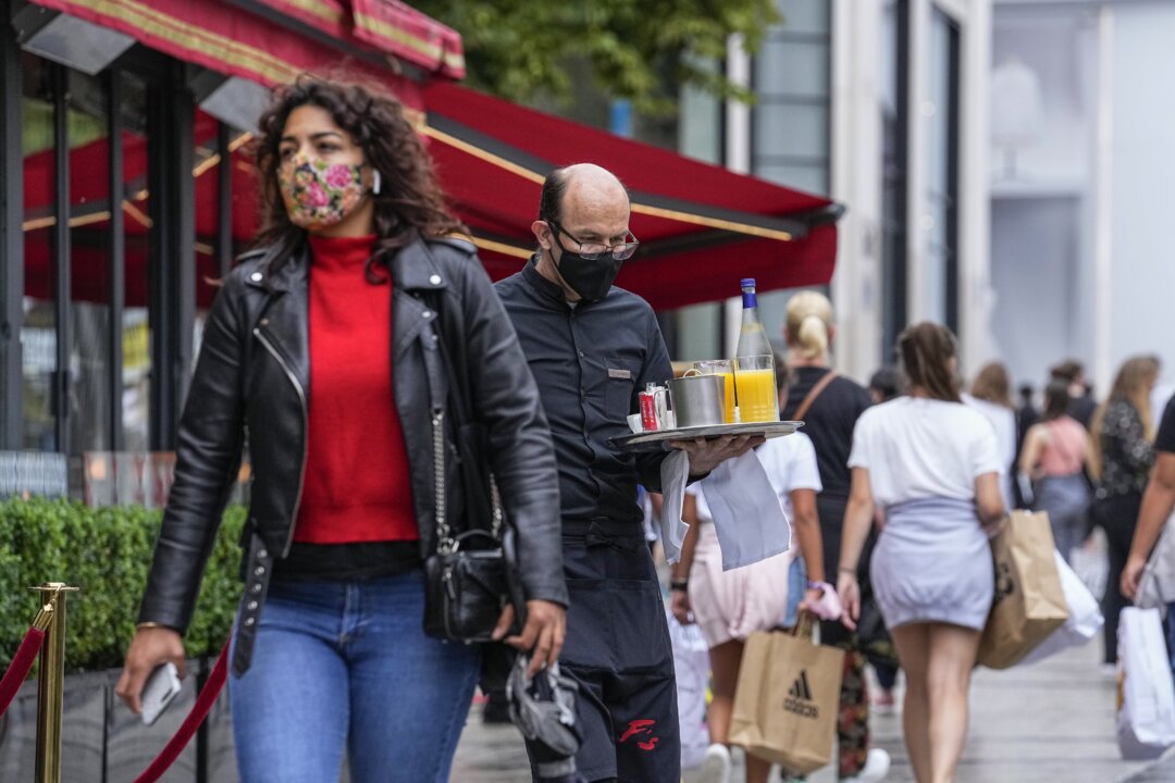 We’re Not Virus Police, French Cafes Say of New COVID Pass