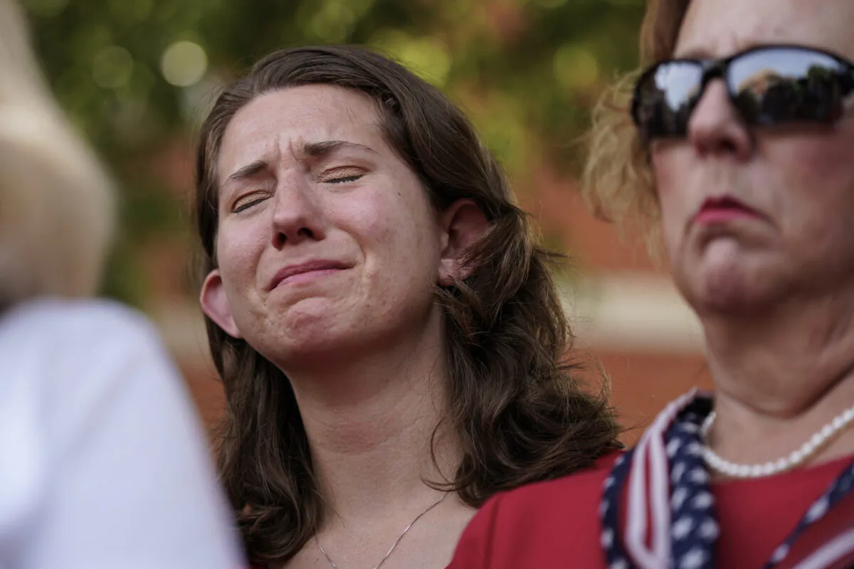 Montana Geimer, daughter of Wendi Winters, a community beat reporter who died in the Capital Gazette newsroom shooting, reacts during a press conference following a verdict in the trial of Jarrod W. Ramos in Annapolis, Md. on July 15, 2021. (Julio Cortez/AP Photo)