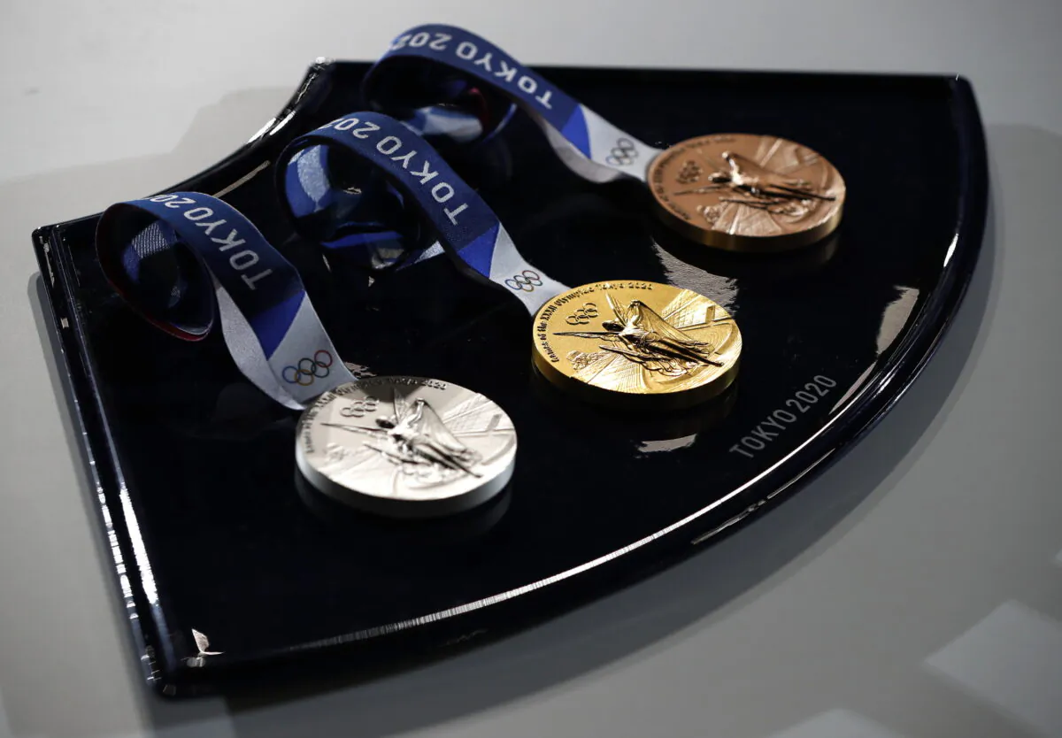A medal tray that will be used during the victory ceremonies at the Tokyo 2020 Olympic Games is displayed during an unveiling event at the Ariake Arena in Tokyo, Japan, on June 3, 2021. (Issei Kato/Pool/Getty Images)