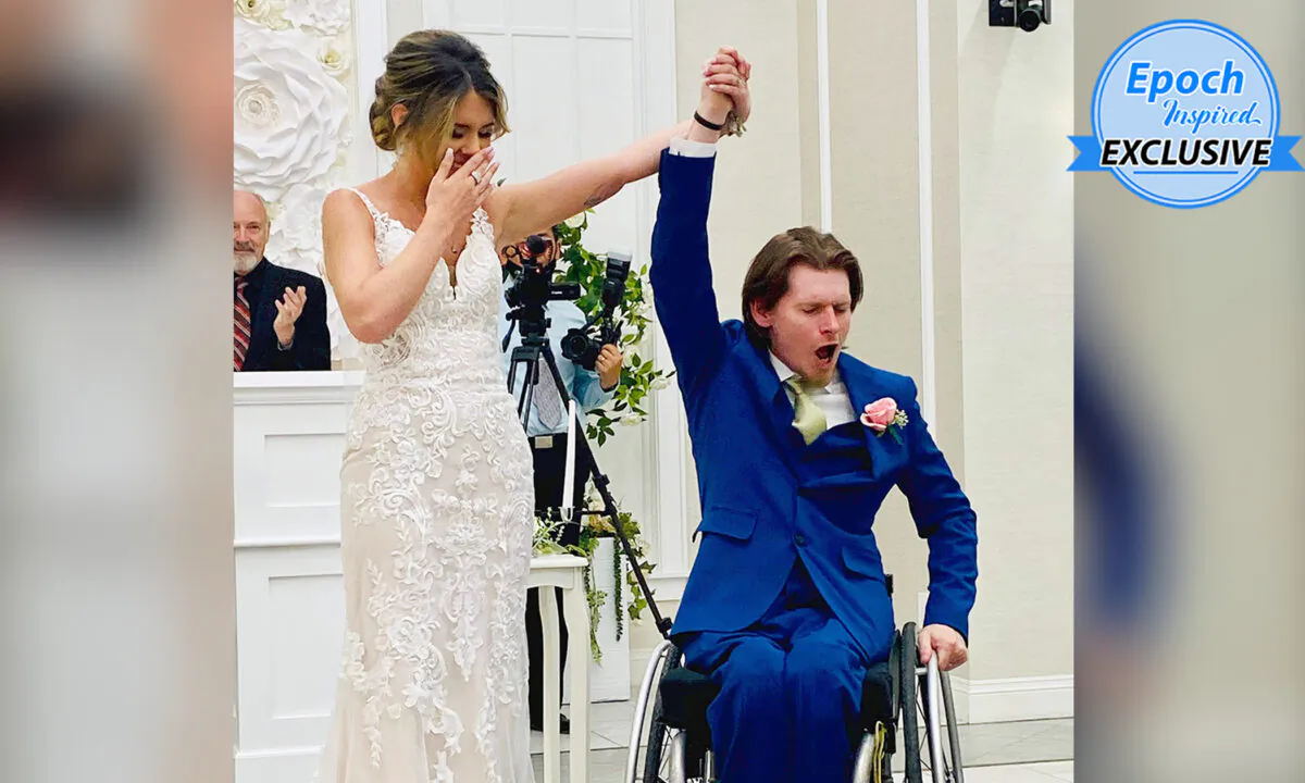 Ryan Estep and Chandler Dendy Estep celebrating their wedding moment when they were pronounced husband and wife. (Courtesy of Ryan Estep)