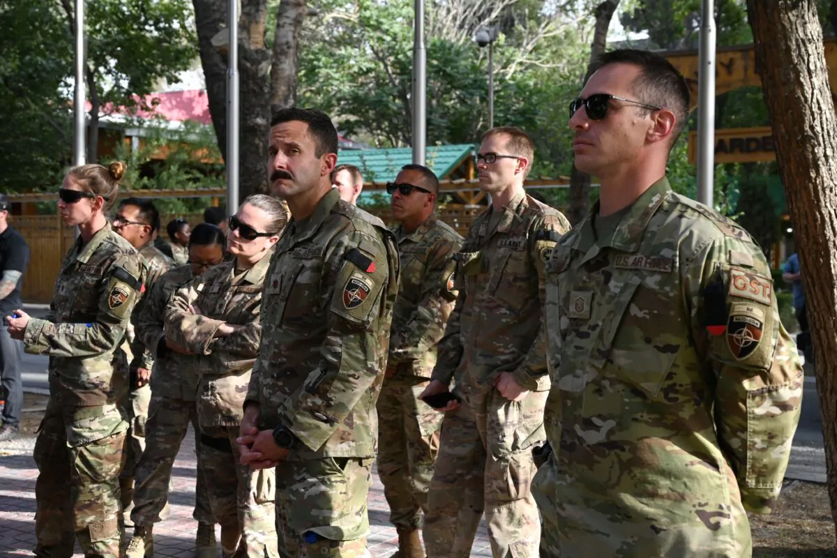 U.S. military personnel stand during an official handover ceremony at the Resolute Support headquarters in the Green Zone in Kabul, Afghanistan, on July 12, 2021. (PWakil Kohsar/AFP via Getty Images)