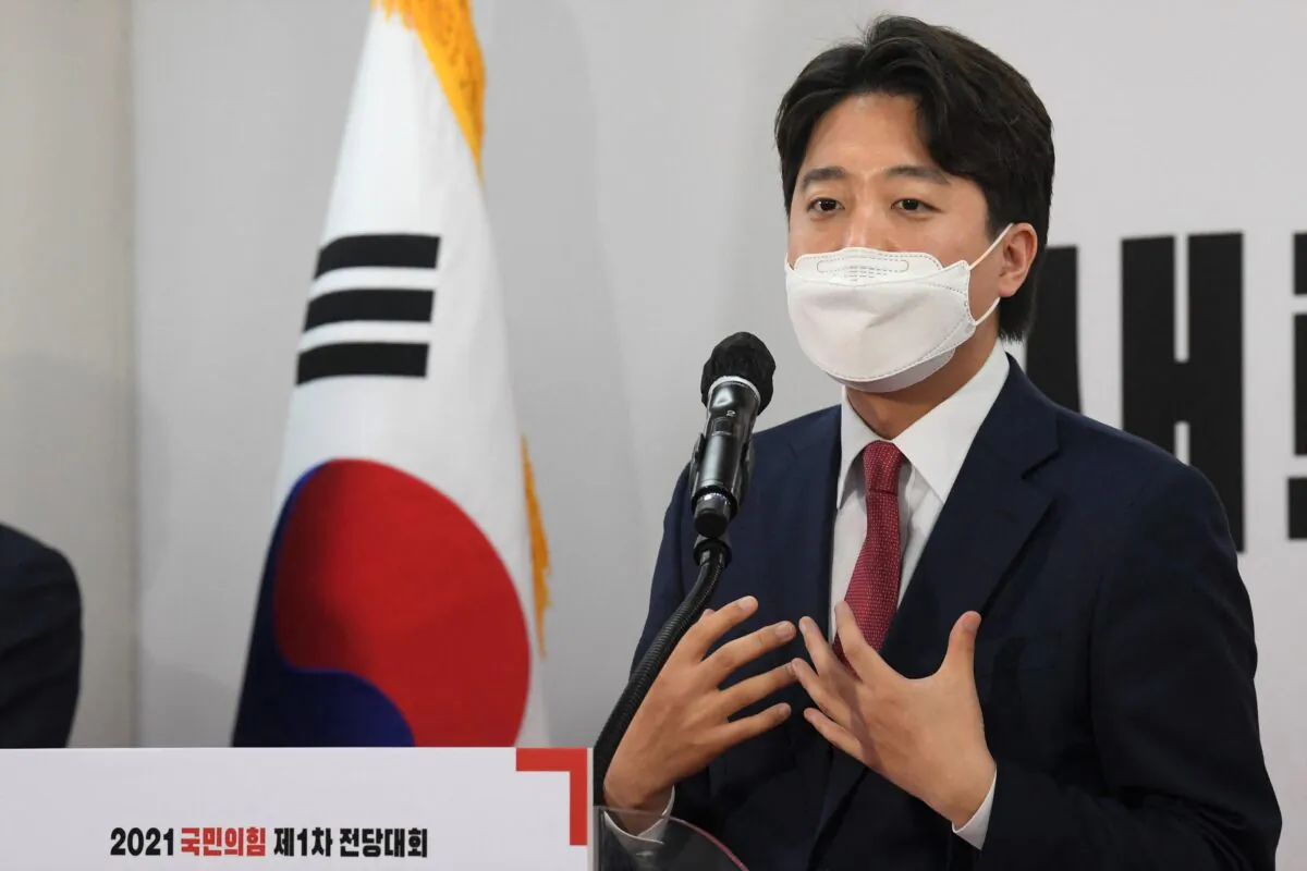 Lee Jun-seok, newly elected chairman of the main opposition People Power Party (PPP), speaks at the party's headquarters in Seoul on June 11, 2021. (KIM MIN-HEE/AFP via Getty Images)