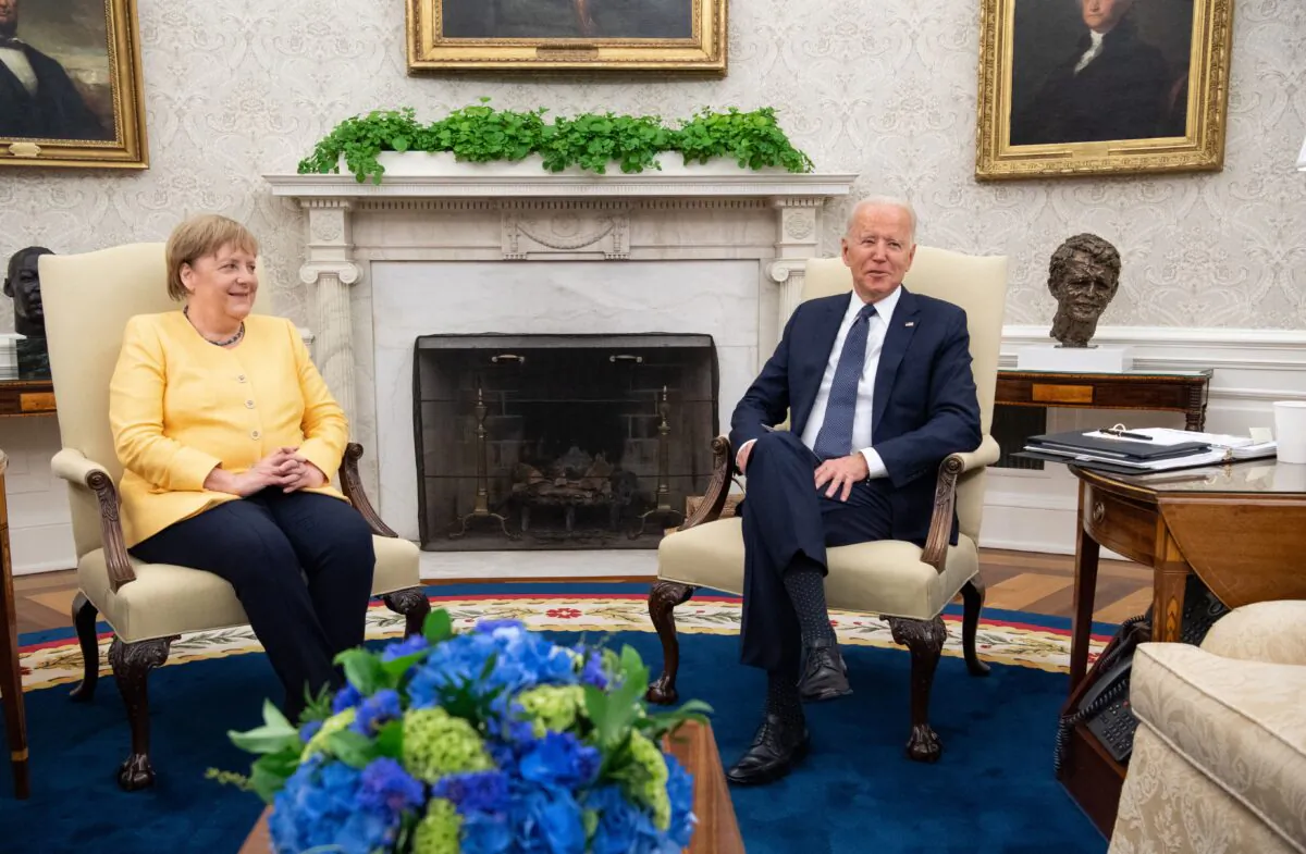President Joe Biden and German Chancellor Angela Merkel holda a meeting in the Oval Office of the White House in Washington, on July 15, 2021. (Saul Loeb/AFP via Getty Images)