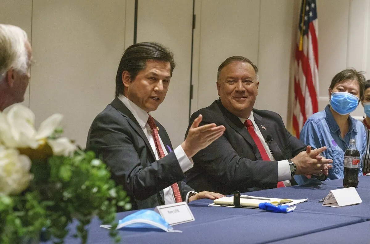 A file image of Nury Turkel, the vice chair of the U.S. Commission on International Religious Freedom, meeting with then-U.S. Secretary of State Mike Pompeo and Chinese dissidents in Washington in July 2020. (Ron Przysucha/U.S. State Department)