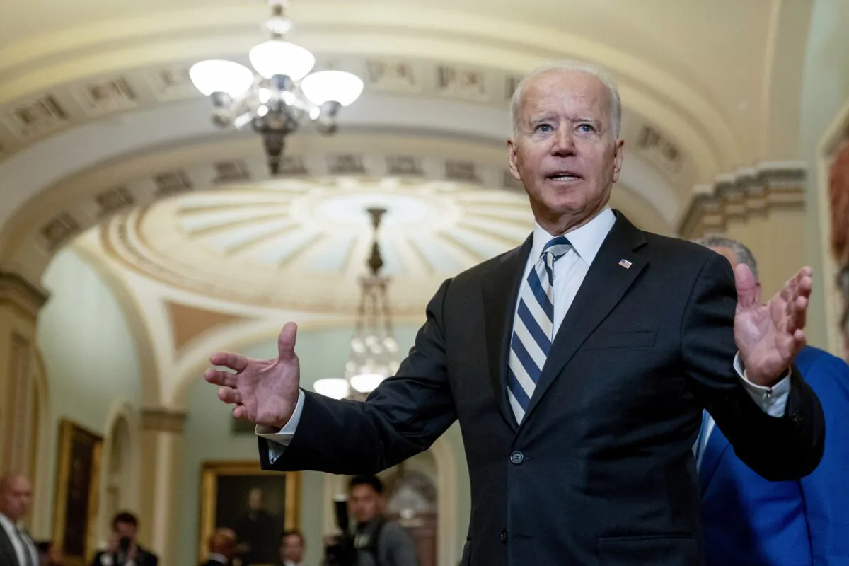 President Joe Biden speaks with reporters after meeting with Senate Democrats at the Capitol in Washington on July 14, 2021. (Andrew Harnik/AP Photo)