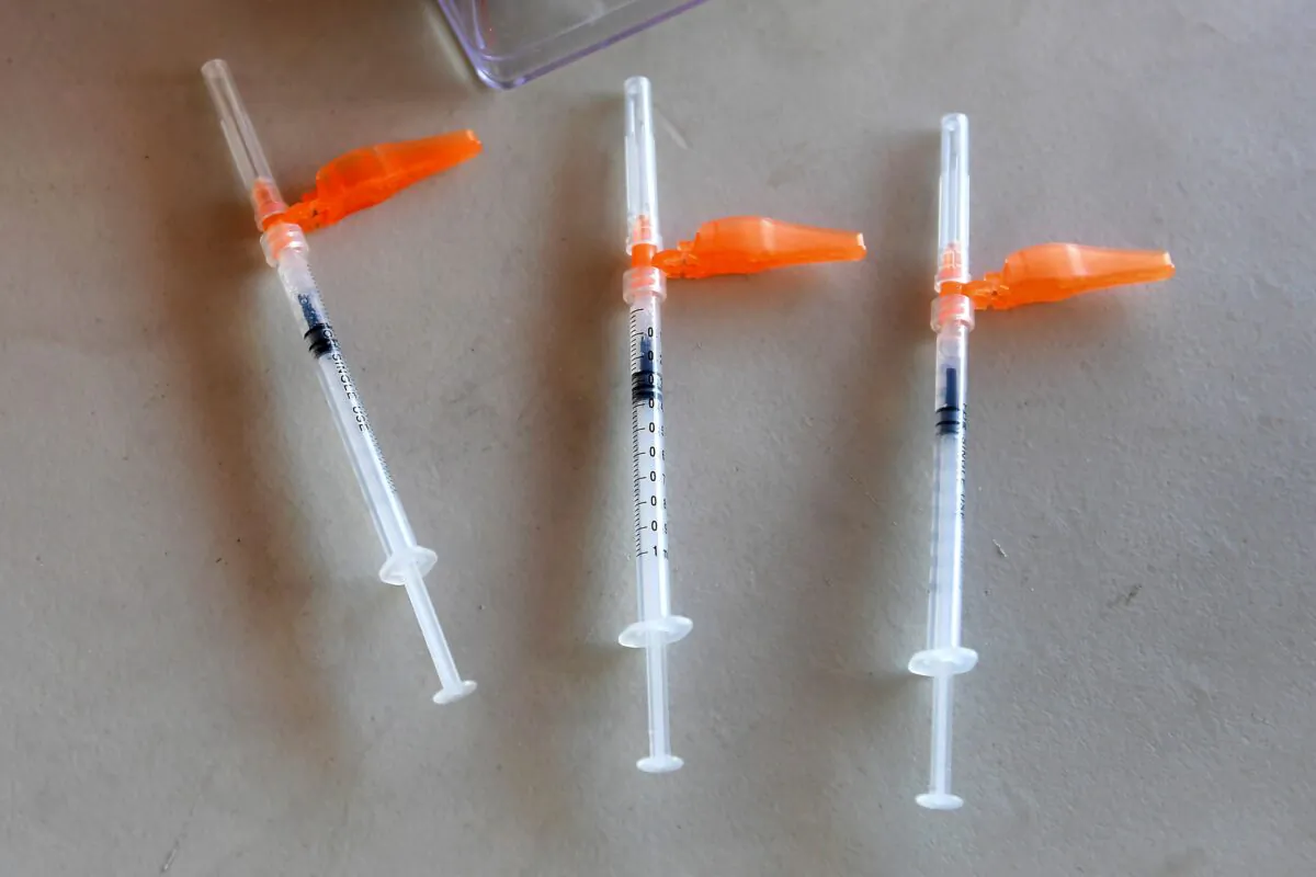 Syringes with the COVID-19 Pfizer vaccine are pictured ready for use at a mobile clinic in Los Angeles, Calif., on July 9, 2021. (Frederic J. Brown/AFP via Getty Images)