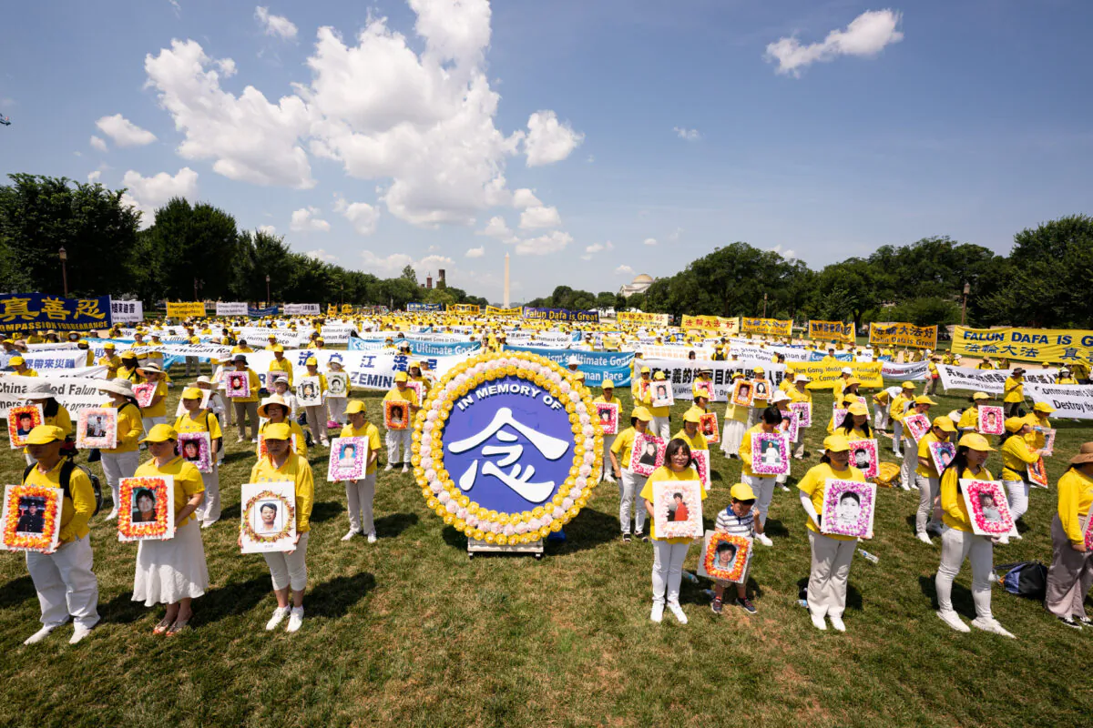 Falun Gong practitioners gather in Washington to mark the 22nd year of the persecution in China, on July 16, 2021. (Larry Dai/The Epoch Times)
