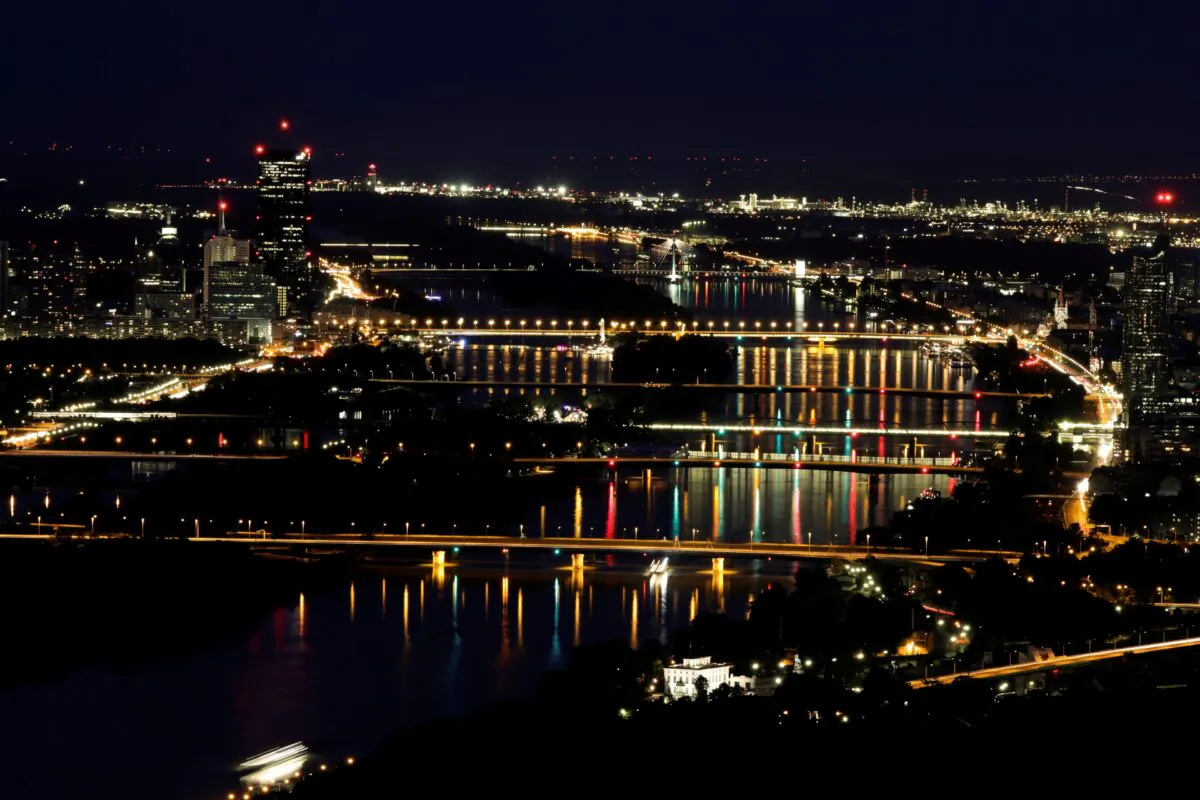 A long time exposure shows a night view of bridges over the Danube river from Leopoldsberg in Vienna, Austria, on Aug. 15, 2019. (Leonhard Foeger/File Photo/Reuters)