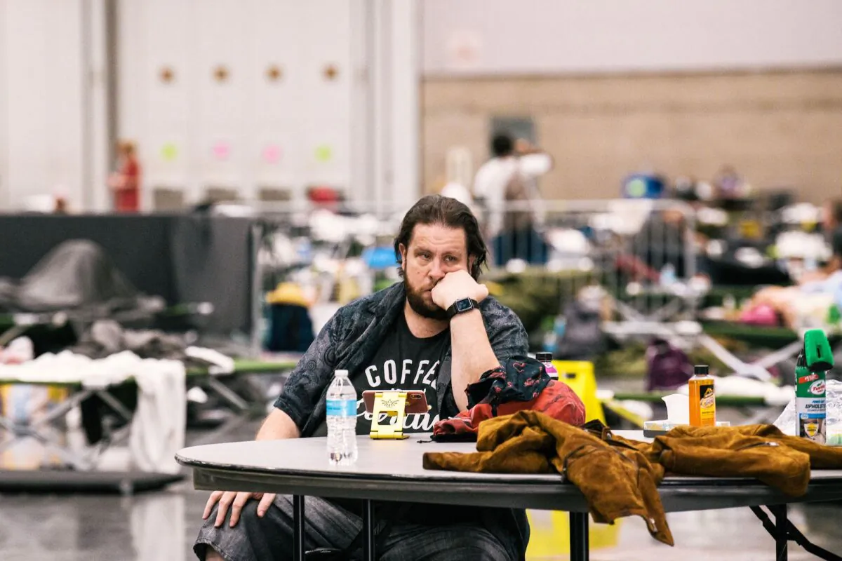 A man rests at the Oregon Convention Center cooling station amid a heatwave in Portland, Ore., on June 28, 2021. (Kathryn Elsesser/AFP/Getty Images)