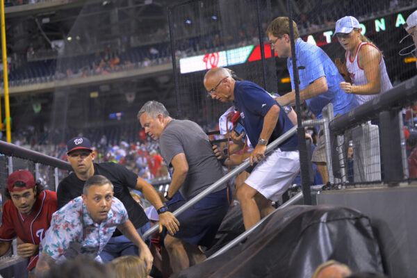 Fans rush to evacuate
