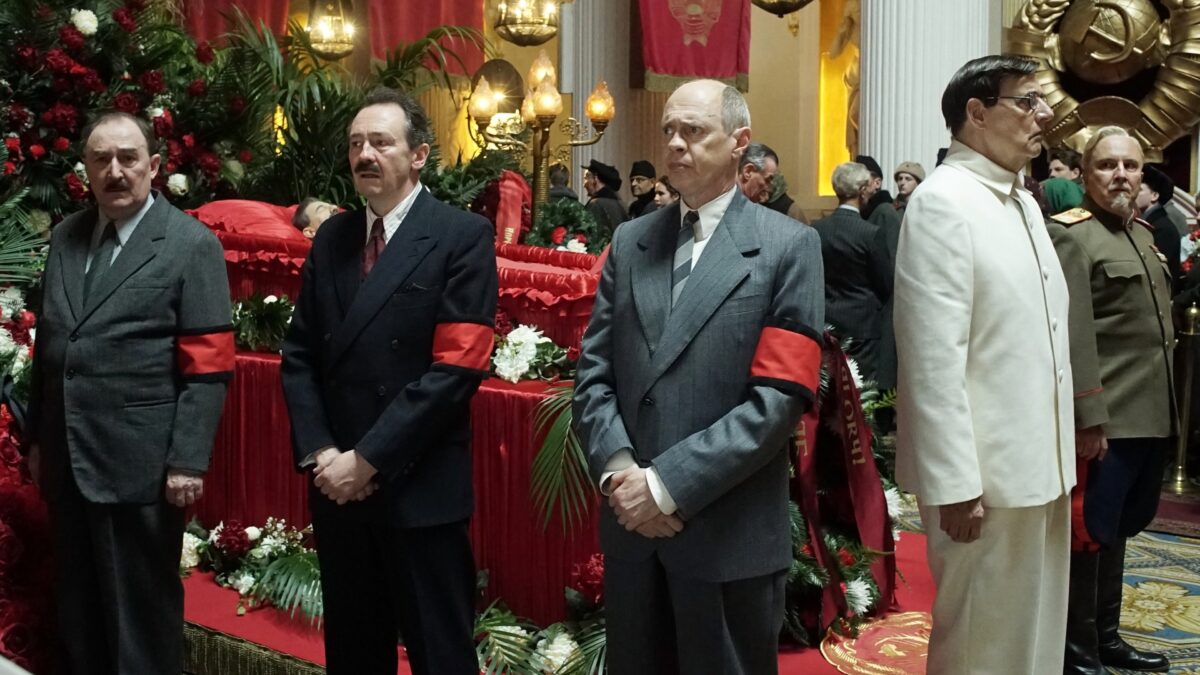 Five men surround casket in The Death of Stalin