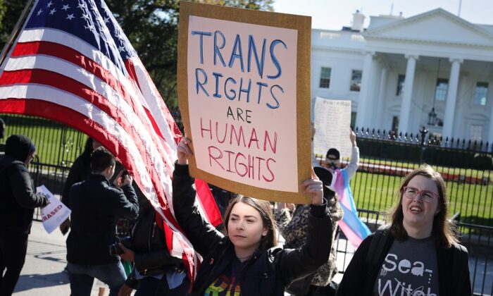 LGBT activists from the National Center for Transgender Equality rally in front of the White House on Oct. 22, 2018. (Chip Somodevilla/Getty Images)