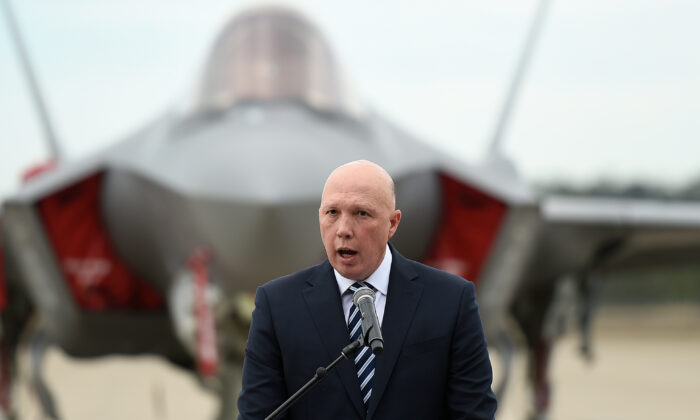 Australia's Minister for Defence Peter Dutton speaks during a ceremony to mark the official commencement of Exercise Talisman Sabre, RAAF Base Amberley, in Brisbane on July 14, 2021. (AAP Image/Albert Perez)