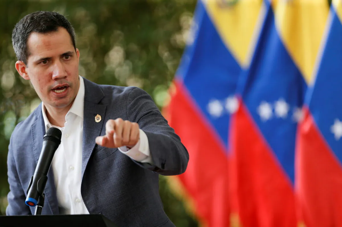 Venezuela's opposition leader Juan Guaido addresses the media, in Caracas, Venezuela, on April 9, 2021. (Manaure Quintero/Reuters)