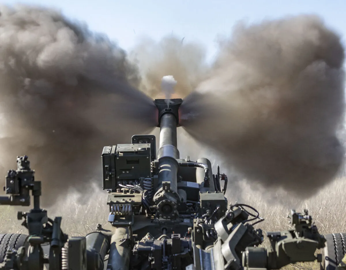 An Australian Army M777 Howitzer fires at Shoalwater Bay Training Area in Queensland during Exercise Talisman Sabre 2021. Exercise Talisman Sabre 2021 (TS21) is the largest bilateral training activity between Australia and the United States, commencing on July 14, 2021. (Supplied: Australian Department of Defence)

