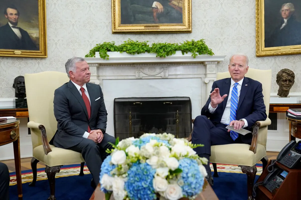 President Joe Biden (R) meets with Jordan's King Abdullah II (L) in the Oval Office of the White House in Washington, on July 19, 2021. (Susan Walsh/AP Photo)